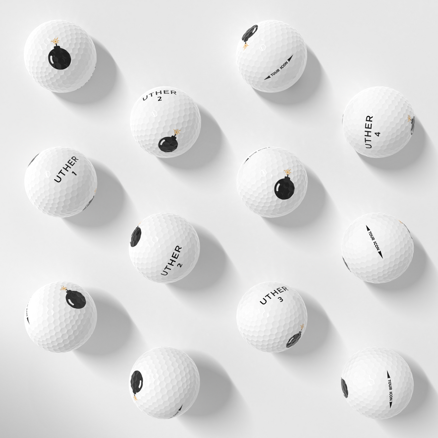 A dozen Hit Bombs Tour Golf Balls.